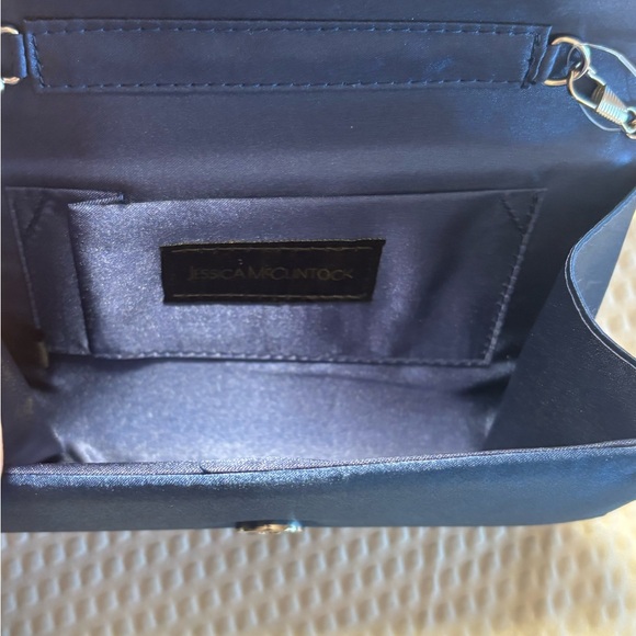 Jessica McClintock Navy Satin Pleated Clutch with Rhinestone Detail and Chain - Picture 4 of 9